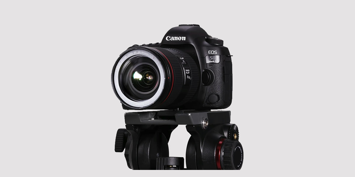 Canon EOS Camera On a Tripod Photo